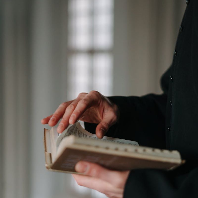 A calm and focused person meditating in a quiet space.